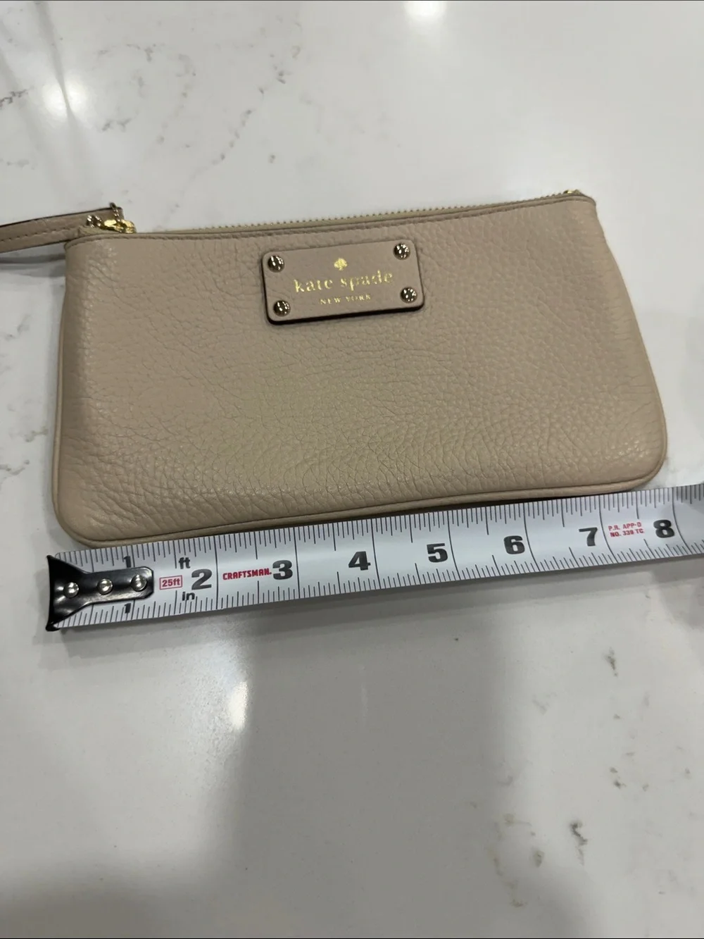 kate spade Pebbled Leather Wristlet - Light Beige